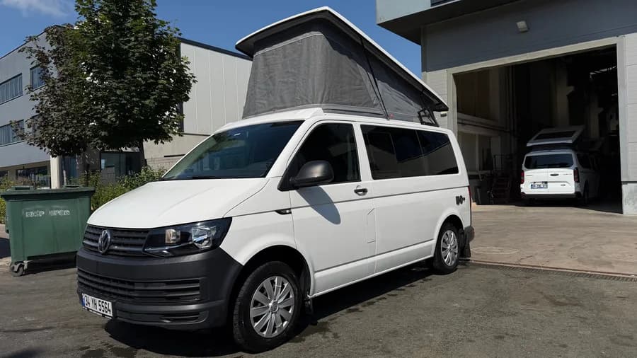 VW T6 Cappadocia, front three-quarter view with the pop-up roof raised
