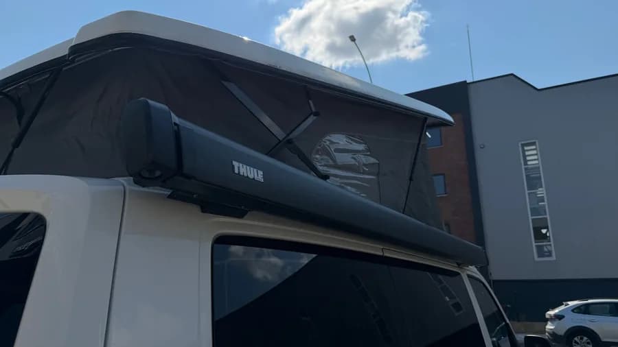 Detail of the Thule side awning and the SCA elevating roof