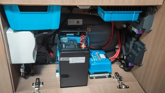 The power bay of the Olympos built into a cabinet with Victron units, the service battery and the wiring